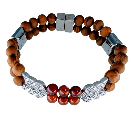Bracelet with wooden beads and silver metal accents on a white background